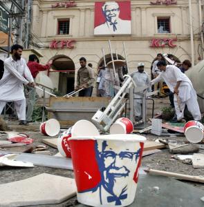 A KFC restaurant being destroyed by people