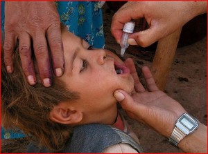 Polio drops given to a child