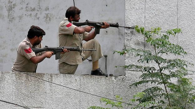 Indian police firing on attackers