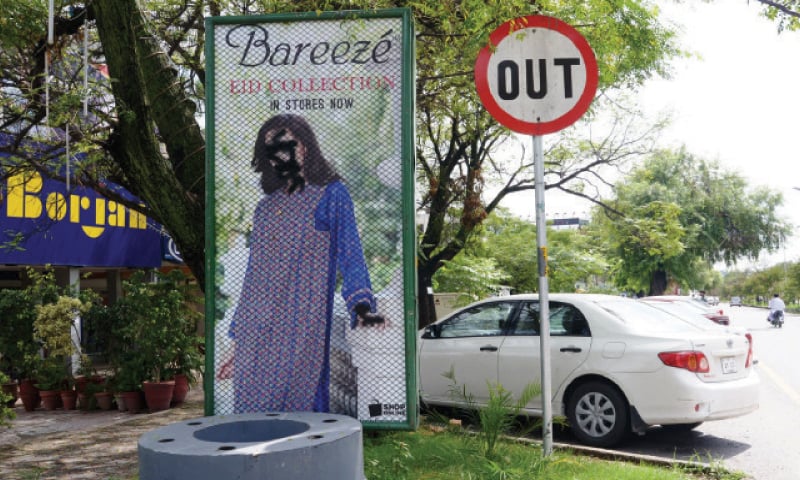 Morality brigades deface billboards in Islamabad